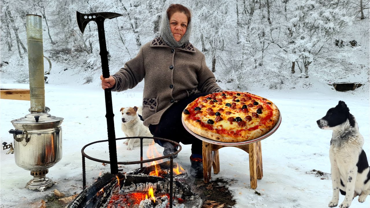 Cocinando pizza de fogata en The Sadj Grill, la mejor pizza que jamás comerás