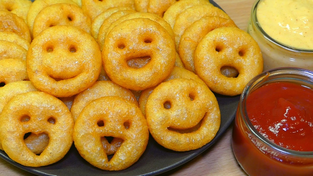 Emoticono de patata emoji y salsa de queso